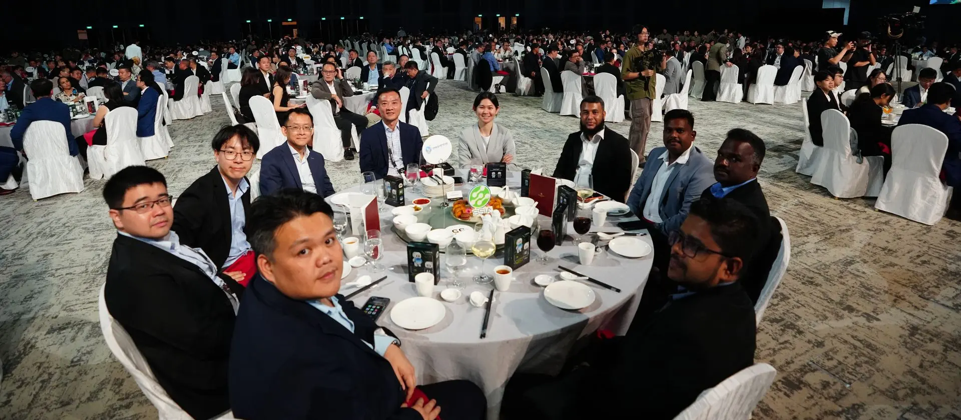 SSIA Semiconductor Dinner 2026 – Industry Gathering Group of attendees posing for a photograph around a dinner table at the SSIA Semiconductor Dinner 2026.